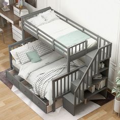 a bunk bed with drawers underneath it in a room