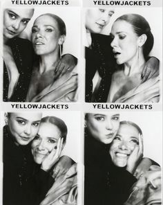 black and white photo of three women with yellow jackets on their heads, one woman has her arm around the other's neck