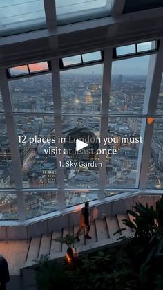 the view from the top of the shard tower in london, england at dusk