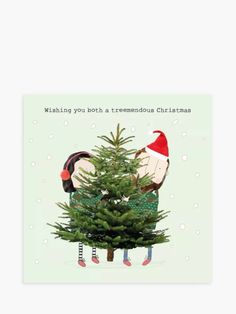 two birds sitting on top of a christmas tree with the words wishing you both a tremendous christmas