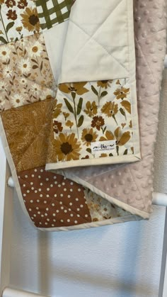 three quilts are arranged on top of each other in the shape of sunflowers