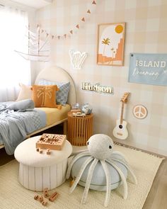 a child's bedroom decorated in pastel colors with an octopus bed and toys