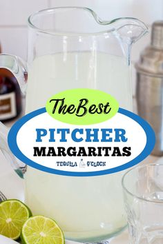 the best pitcher margaritas recipe with lime and vodka in front of it on a counter