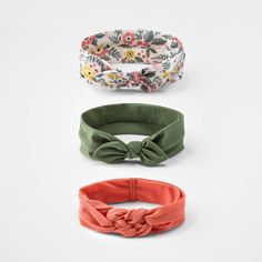 Add the perfect finishing touch to your little one's ensembles with this 3-Pack Sailor Knot Headwraps from cloud island™. Each of the three headwraps in this pack is made from soft fabric with just the right amount of stretch to fit securely around their head. The baby headwrap set includes three headbands — one in an olive green shade and one with a floral pattern, both featuring a knotted bow detail at the top, and one in a coral color with a sailor knot at the top — giving you plenty of optio Cute Newborn Baby Boy, Baby Boy Swimwear, Baby Boy Overalls, Cloud Island, Baby Girl Swimsuit, Baby Boy Sweater, Baby Girl Pajamas, Winter Baby Clothes, Baby Head Wrap