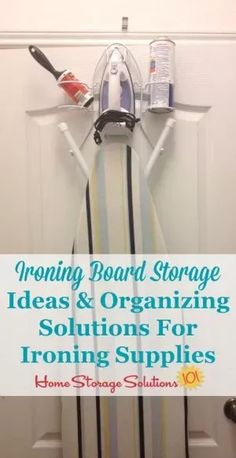 an ironing board is hanging on the wall next to a door and some other items