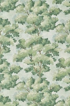 a green and white wallpaper with trees on it