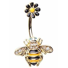 a yellow and black bee belly ring with crystal stones on the bottom, attached to a flower