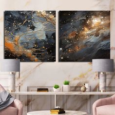 two paintings on the wall in a living room