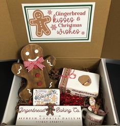 gingerbread and cheese christmas wishes gift box with gingerbread cookies, marshmallows, cinnamon sticks, crackers