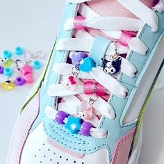 Sanario Charm Set For Any Laced Footwear. I Love How Charm Sets Turn A Boring Pair Of Kicks Into A Statement! This Set Has 7 Character Charms And A Mix Of Companion Slider Beads In Coordinating Colors I Used Adhesive For The Eye Finding And Then Added Two Double Splits For The Lace Attachments Roller Skate Accessories, Hello Kitty Shoes, Beaded Shoes, Roller Skate, Roller Skates, Charm Set, Shoe Charms, Coordinating Colors, Doc Martens