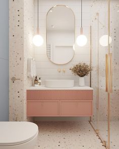 a bathroom with a sink, mirror and toilet in it's centerpieces