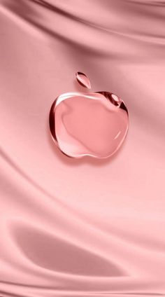 an apple logo is shown on the pink silk material that looks like it has been made from