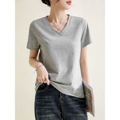 Summer Solid Color V-Neck Black Basic Tee - graphictee.co Casual Gray V-neck Top, Casual V-neck Plain Top, Solid Color Stretch V-neck T-shirt, Plain Cotton V-neck Top, V-neck Stretch Shirt In Solid Color, Plain V-neck Top, Casual Stretch V-neck T-shirt, Casual V-neck Stretch T-shirt, Casual Solid Color V-neck Tops