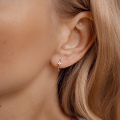 Inspired by the strength and stability of the number 3, our Trinity Huggie Hoop Earrings, with their pyramid of zirconia stones set into the front face, encourage you to find your own inner power. Made from 14 karats solid gold, these hoops are built to last a lifetime and are ready to wear when you need to feel confident, calm, and unshakeable.  Features: ✨ 14K Gold Earrings Hoops ✨ Material: 14k solid gold (58.3% of gold purity), cubic zirconia ✨ Waterproof earrings ✨ Inner diameter: 9 mm (0.3 Gold Earrings Hoops, Trinity Earrings, Gold Huggies, Dot Earrings, Huggie Earrings Gold, Gold Dot, Earrings Hoops, Hoops Gold, Bride Earrings