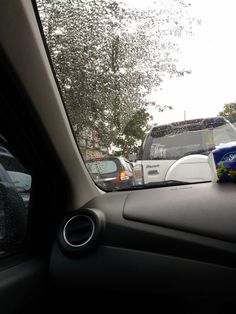 the view from inside a car looking at traffic