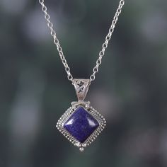 Those with a passion for science and natural curiosity will find the perfect complement in this majestic piece by local Indian artisans. Presented by Neeru Goel, this sterling silver pendant necklace has superb silversmithing work polished for a luxurious look, masterfully embracing a lapis lazuli cabochon whose intense blue hue symbolizes intellect. Vampire Diaries Fashion, Lapis Lazuli Jewelry, Lapis Lazuli Pendant, Lapis Lazuli Necklace, Sterling Silver Necklace Pendants, Birthstone Necklace, Silver Pendant Necklace, Jewelry Gift Box, Birthstone Jewelry