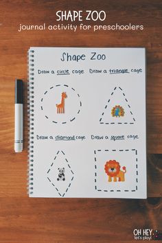 the shape zoo worksheet is shown on a wooden table with a pen and marker