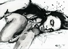 a black and white drawing of a woman laying down