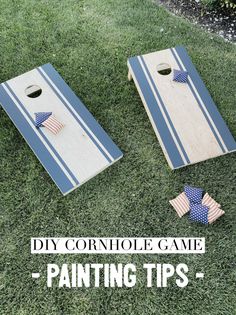 two cornhole game boards sitting on top of grass with the words diy cornhole game painting tips