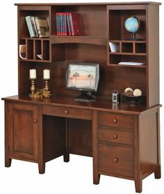 a computer desk with bookshelf and drawers