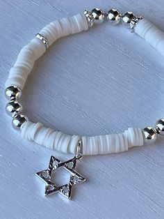 Israel White & Silver Stretch Bracelet with Silver Star of David Charm  Wear casually or for special occasion  Or church Stacked Beaded Bracelets, Columbia Mo, Star Of David, Silver Stars, Stretch Bracelet, White Silver, Silver Beads, Stretch Bracelets, Beaded Bracelet