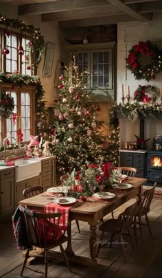 a dining room table set for christmas dinner