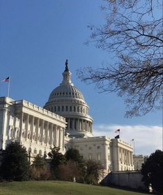 the u s capitol building in washington, d c is pictured on a sunny day