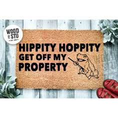 a door mat that says hippity hoppy get off my property