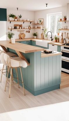 a kitchen with blue cabinets and wooden counter tops, white chairs and open shelving