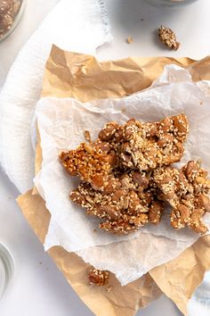 three pieces of granola are on a paper plate