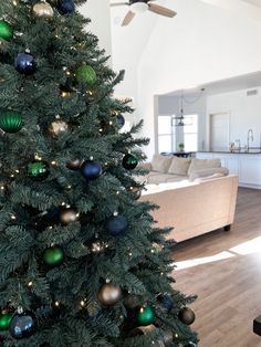 a decorated christmas tree in a living room