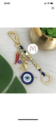 a key chain with an evil eye on it