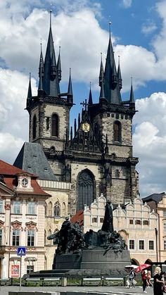 a large building with many towers on top of it