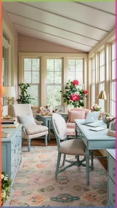 a living room filled with lots of furniture and flowers in vases on the windowsill