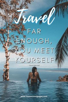 a woman sitting in the water next to a palm tree with text that reads travel far enough, you meet yourself