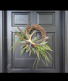 a wreath is hanging on the front door