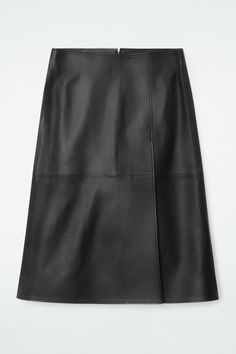 The versatility of a leather skirt shouldn't be underestimated. This piece is crafted from supple black hide and features a folded pleat to accentuate the A-line midi shape. Style it with shirts, tees and knitwear. Slim fitZip closureCOS supports responsible manufacturing via the Leather Working Group Shell: 100% Leather. Excluding trims Back length of size 6 is 28.54" / Model wears a size 6 Belted Cape, Leather Midi Skirt, Accessories Bags Shoes, Women Magazines, Cardigan Shirt, Black Midi Skirt, Winter Coats Jackets, Denim Coat, Denim Outfit