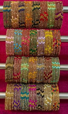 Beautiful Colourful Handmade Bangle designed By T4 Jewels. fabulous Designs Looks is very stunning & unique. these bangles are easy to wear on silky fabric like Saree and any other outfit. You can wear is on Daily way so please hurry up and Buy Mix & Match personalize metal bangle and make your moment memorable. Good Choice for Wedding Gifts Available in 2.10, 2.12, 2.14 bangle size Luxury Gemstone Bangle For Festivals, Multicolor Stone Work Bracelets For Festivals, Fabric Bangles, Glass Bangles, Bangles Indian, Packing Jewelry, Bridal Bangles, Handmade Bangles, Bangle Designs