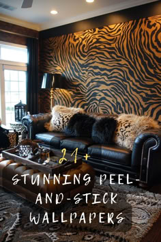 a living room with zebra print wallpaper and leather furniture