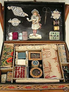 an old wooden box filled with assorted items