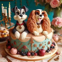 two dogs sitting on top of a cake