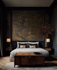 a bedroom with a large painting on the wall and a bed in front of it