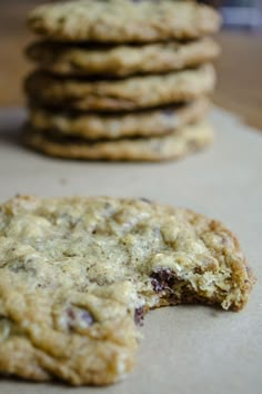 an oatmeal chocolate chip cookie is cut in half and stacked on top of each other