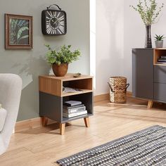 a living room scene with focus on the end table and storage unit in the corner