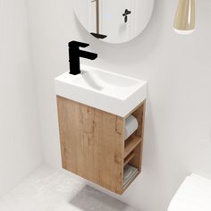 a bathroom with a sink, mirror and toilet paper dispenser in it