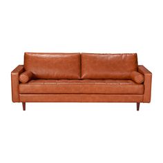 a brown leather couch sitting on top of a white floor