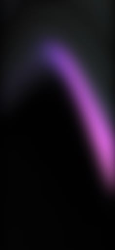 a black and purple background with blurry lines