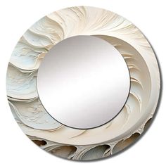 a circular mirror with an abstract design on it