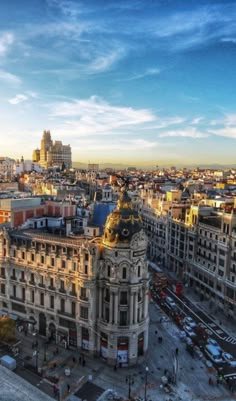 an aerial view of a city with tall buildings