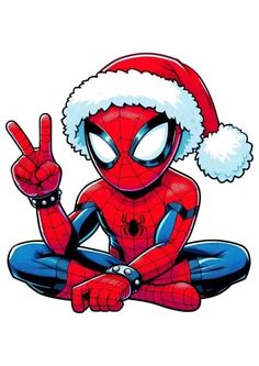 a spiderman wearing a santa hat and sitting on the ground with his fingers up